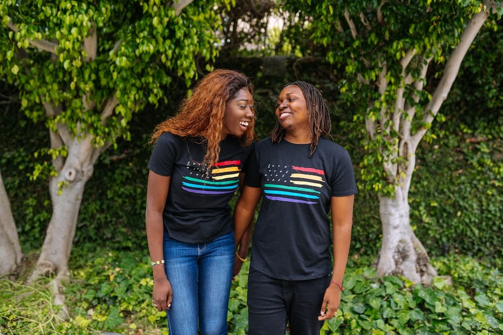 couple wearing pride t-shirts
