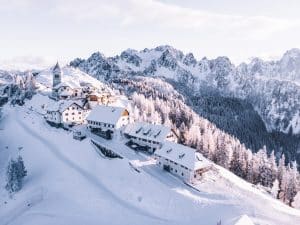 Houses on a mountain covered in snow