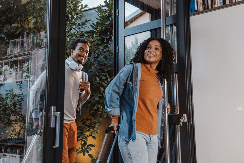 Couple checking into a vacation rental