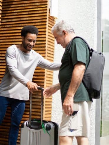 Host helping guest at checkin