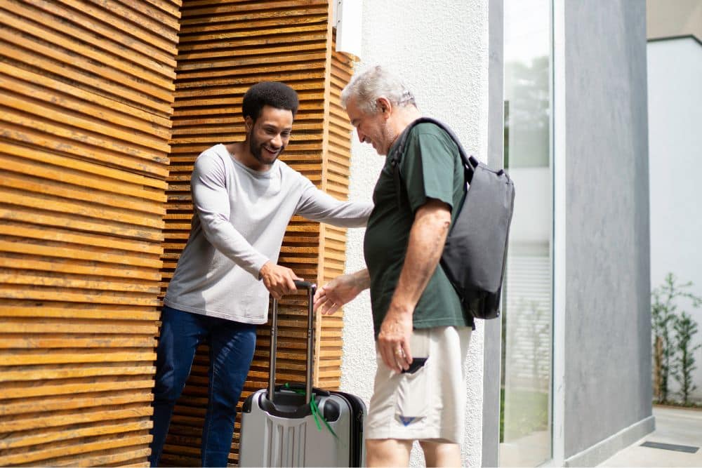 Host helping guest at checkin